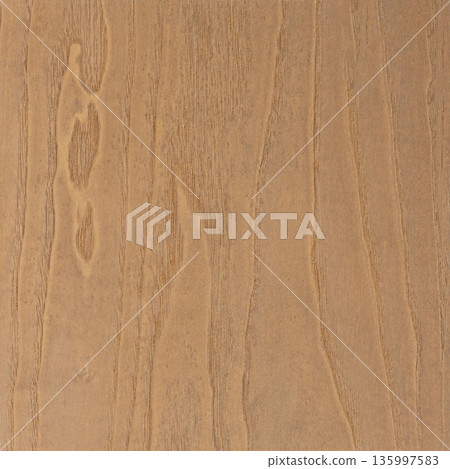 Natural light brown wood grain texture featuring prominent vertical lines and organic patterns. 135997583