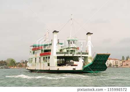 Ro ro car ferry sailing with open bow ramp 135998572