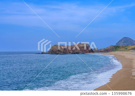 Japan's beautiful coastline seen from Tateiwa: A spectacular view of sandy beaches, blue seas, and distinctive reefs 135998676