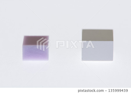 Comparison of raw e.max and zirconia. Size differences in dental materials before sintering 135999439