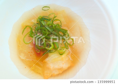 Ozoni served in a white bowl 135999951
