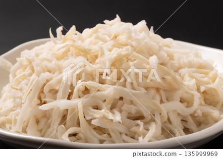 Dried strips of daikon radish (rehydrated) Dried strips of daikon radish (rehydrated) 135999969