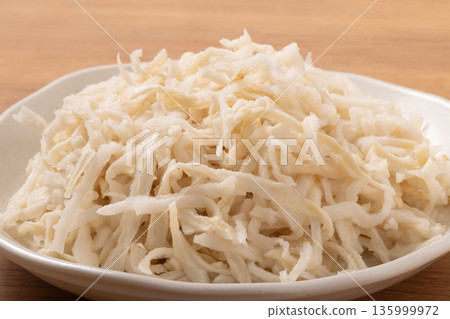 Dried strips of daikon radish (rehydrated) Dried strips of daikon radish (rehydrated) 135999972