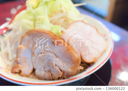 Jiro-style ramen with a mountain of vegetables and roast pork Jiro-style ramen with a mountain of vegetables and roast pork 136000122