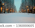 Snow-covered city street and winter morning view 136000605