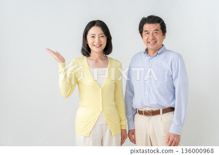 A middle-aged couple on a white background A middle-aged couple on a white background 136000968