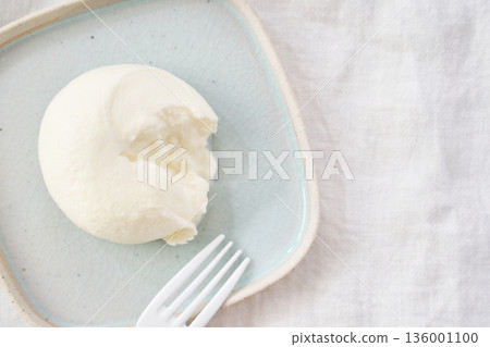 Burrata cheese that can be cut open to reveal the inside Burrata cheese that can be cut open to reveal the inside 136001100