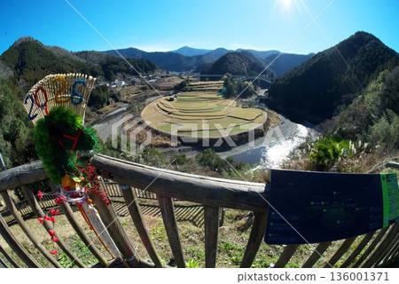 Rice terrace landscape with mountains and rivers seen from above Rice terrace landscape with mountains and rivers seen from above 136001371
