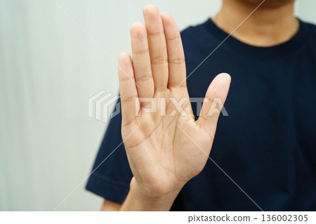 Man holding cigarette, no smoking. Man holding cigarette, no smoking. 136002305