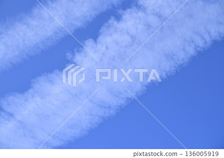 Yokohama cityscape in Japan: A rare sight: aircraft passing by... Two vanishing contrails and a passing aircraft... A rush of aircraft... A glorious era Yokohama cityscape in Japan: A rare sight: aircraft passing by... Two vanishing contrails and a passing aircraft... A rush of aircraft... A glorious era 136005919