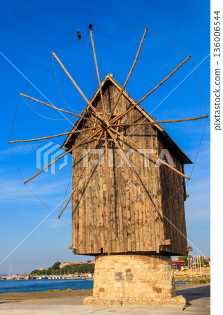 Old wooden windmill in the old town of Nessebar, Bulgaria Old wooden windmill in the old town of Nessebar, Bulgaria 136006544
