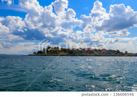 View of the old town of Nessebar and the Black sea, Bulgaria. View from a sea View of the old town of Nessebar and the Black sea, Bulgaria. View from a sea 136006548