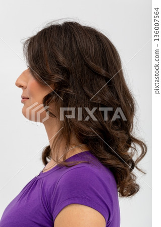 Business woman portrait, Elegant female headshot with curls, Professional woman image with textured blouse, Corporate profile picture featuring woman with soft lighting and curls Business woman portrait, Elegant female headshot with curls, Professional woman image with textured blouse, Corporate profile picture featuring woman with soft lighting and curls 136007564