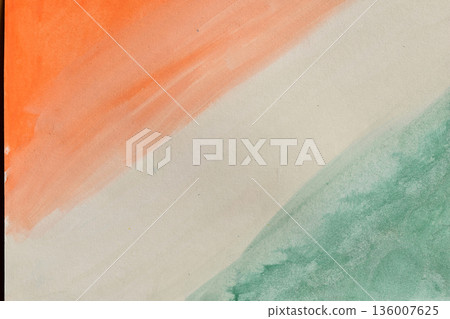 Abstract watercolor brushstrokes of orange and green on a white background, representing the colors of the Indian flag. Festive art, perfect for national holidays. 136007625