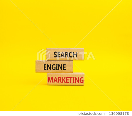 Search Engine Marketing symbol. Wooden blocks with words Search Engine Marketing. Beautiful yellow background. Business and Search Engine Marketing concept. Copy space. Search Engine Marketing symbol. Wooden blocks with words Search Engine Marketing. Beautiful yellow background. Business and Search Engine Marketing concept. Copy space. 136008178