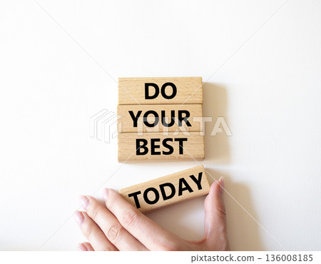 Do Your Best Today symbol. Concept words Do Your Best Today on wooden blocks. Beautiful bright white background. Businessman hand. Business and Do Your Best Today concept. Copy space. Do Your Best Today symbol. Concept words Do Your Best Today on wooden blocks. Beautiful bright white background. Businessman hand. Business and Do Your Best Today concept. Copy space. 136008185