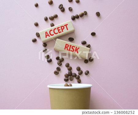Accept Risks symbol. Concept words Accept Risks on beautiful wooden picture frame. Beautiful pink background with coffee cup and coffee beans. Business and Accept Risks concept. Copy space. Accept Risks symbol. Concept words Accept Risks on beautiful wooden picture frame. Beautiful pink background with coffee cup and coffee beans. Business and Accept Risks concept. Copy space. 136008252