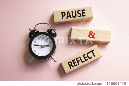 Pause and Reflect symbol. Concept words Pause and Reflect on wooden blocks. Beautiful pink background with alarm clock. Business and Pause and Reflect concept. Copy space. Pause and Reflect symbol. Concept words Pause and Reflect on wooden blocks. Beautiful pink background with alarm clock. Business and Pause and Reflect concept. Copy space. 136008439
