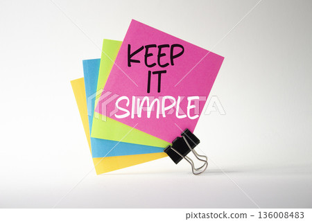 Keep it Simple symbol. Concept words Keep it Simple on sticky notes. Beautiful white background. Business and Keep it Simple concept. Copy space. 136008483