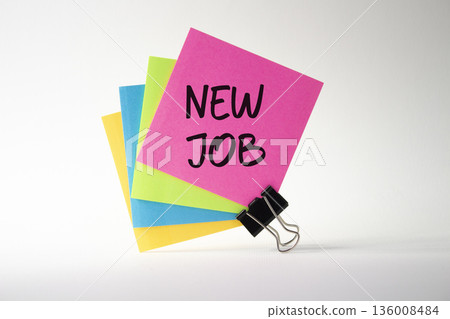 New job symbol. Pink sticky note with concept words New Job. Beautiful white background. Business and New job concept. Copy space. 136008484