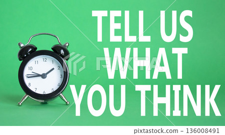 Tell us what you think symbol. Wooden blocks with words Tell us what you think. Beautiful green background with alarm clock. Business and Tell us what you think concept. Copy space. Tell us what you think symbol. Wooden blocks with words Tell us what you think. Beautiful green background with alarm clock. Business and Tell us what you think concept. Copy space. 136008491