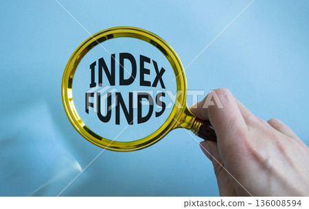 Index Funds symbol. Magnifying Glass with words Index Funds. Businessman hand. Beautiful blue background. Business and Index Funds concept. Copy space. Index Funds symbol. Magnifying Glass with words Index Funds. Businessman hand. Beautiful blue background. Business and Index Funds concept. Copy space. 136008594