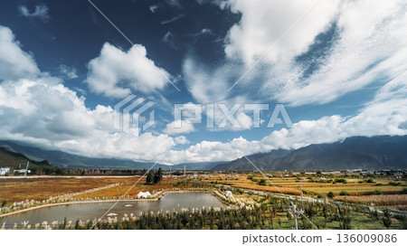 Farmland and lake below Yulong Snow Mountain, Lijiang Farmland and lake below Yulong Snow Mountain, Lijiang 136009086