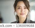 A Japanese businesswoman with a calm expression 136009688