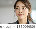 A Japanese businesswoman with a calm expression 136009689