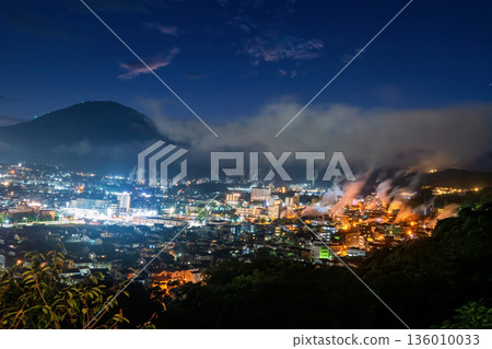 Beppu town with motion steam of hot spring and stars at night , Oita 136010033