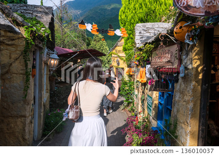 Tourist girl photo iconic Yufuin floral village, Oita, Japan 136010037
