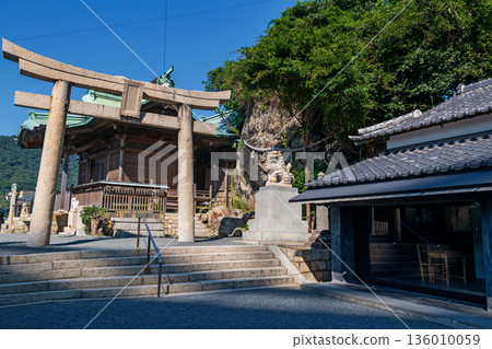 Torii gate to Mekari Shrine against blue sky, Kitakyushu 136010059
