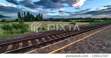 Abandoned Trainstation With Rural Landscape And Lake Balaton In Hungary 136012387
