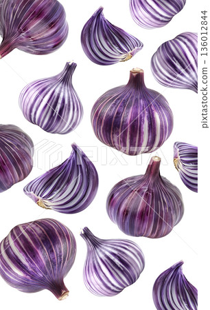Multiple striped purple onions and slices isolated on white background, food concept emphasizing color and texture Multiple striped purple onions and slices isolated on white background, food concept emphasizing color and texture 136012844