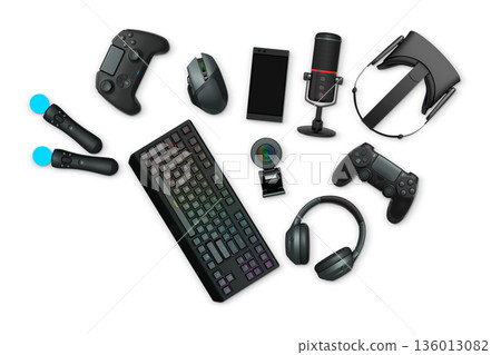 Gaming gear assortment with controllers, keyboard, headset, mouse, and mic isolated on white background with clipping path 136013082