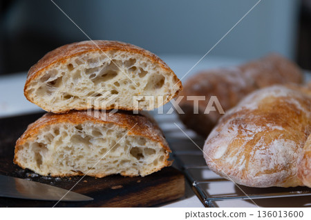 Rustic White Bread With a Golden Crust and Airy Crumb in a Home Kitchen Rustic White Bread With a Golden Crust and Airy Crumb in a Home Kitchen 136013600