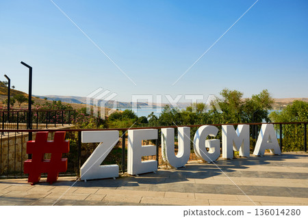 ZEUGMA landmark sign overlooking river valley ZEUGMA landmark sign overlooking river valley 136014280