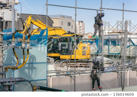 Apartment demolition site and workers Apartment demolition site and workers 136014609