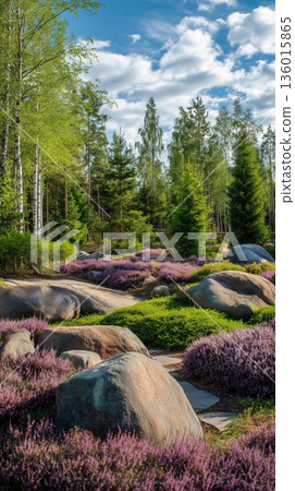 Natural landscape with vibrant flowers and stones under a blue sky Natural landscape with vibrant flowers and stones under a blue sky 136015865