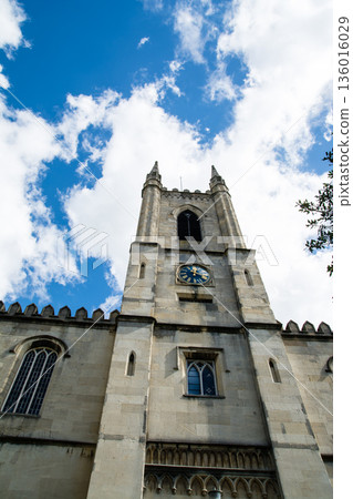 A historic stone church under bright sunlight in Windsor, a suburb of London 136016029