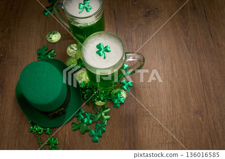 St. Patrick's day celebration with green beer and shamrocks St. Patrick's day celebration with green beer and shamrocks 136016585