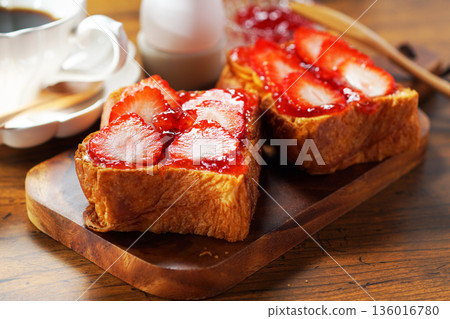 Breakfast image: Strawberry jam and buttered toast topped with fresh strawberries Breakfast image: Strawberry jam and buttered toast topped with fresh strawberries 136016780
