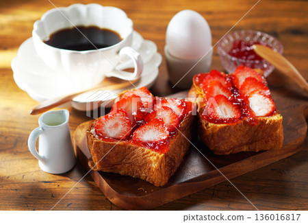 Breakfast image: Strawberry jam and buttered toast topped with fresh strawberries Breakfast image: Strawberry jam and buttered toast topped with fresh strawberries 136016817
