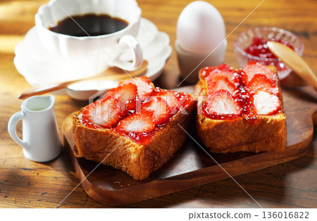 Breakfast image: Strawberry jam and buttered toast topped with fresh strawberries Breakfast image: Strawberry jam and buttered toast topped with fresh strawberries 136016822