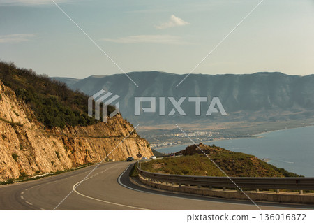 the sea under the mountain on a summer day Vlora, Albania, photographed on August 2025. 136016872