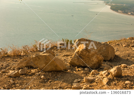 the sea under the mountain on a summer day Vlora, Albania, photographed on August 2025. 136016873