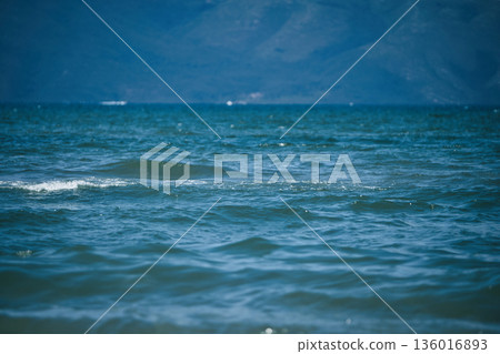 the sea under the mountain on a summer day Vlora, Albania, photographed on August 2025. the sea under the mountain on a summer day Vlora, Albania, photographed on August 2025. 136016893