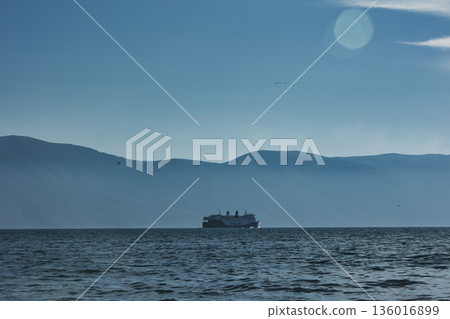 the sea under the mountain on a summer day Vlora, Albania, photographed on August 2025. 136016899