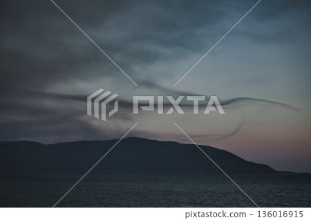 the sea under the mountain on a summer day Vlora, Albania, photographed on August 2025. 136016915