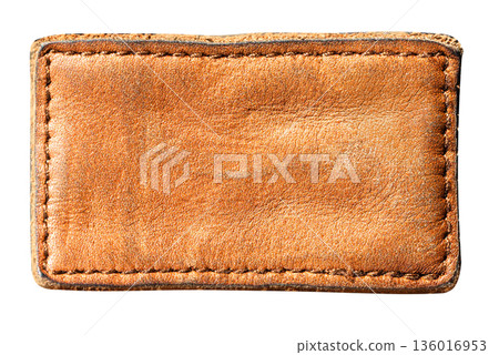 Blank brown leather clothing label with stitching 136016953
